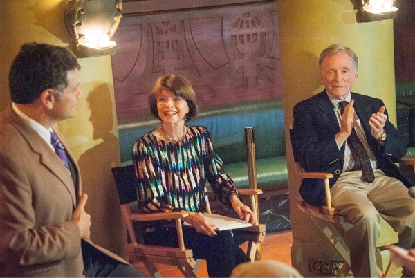 Dana, Harriet and Dick having a conversation in front of an audience.