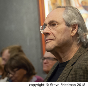 Candid photo of Rob Klein watching the program in the audience.