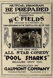 Pool Sharks Released Pool Sharks poster with W.C. Fields sitting on pool table surrounded by a crowd of people.